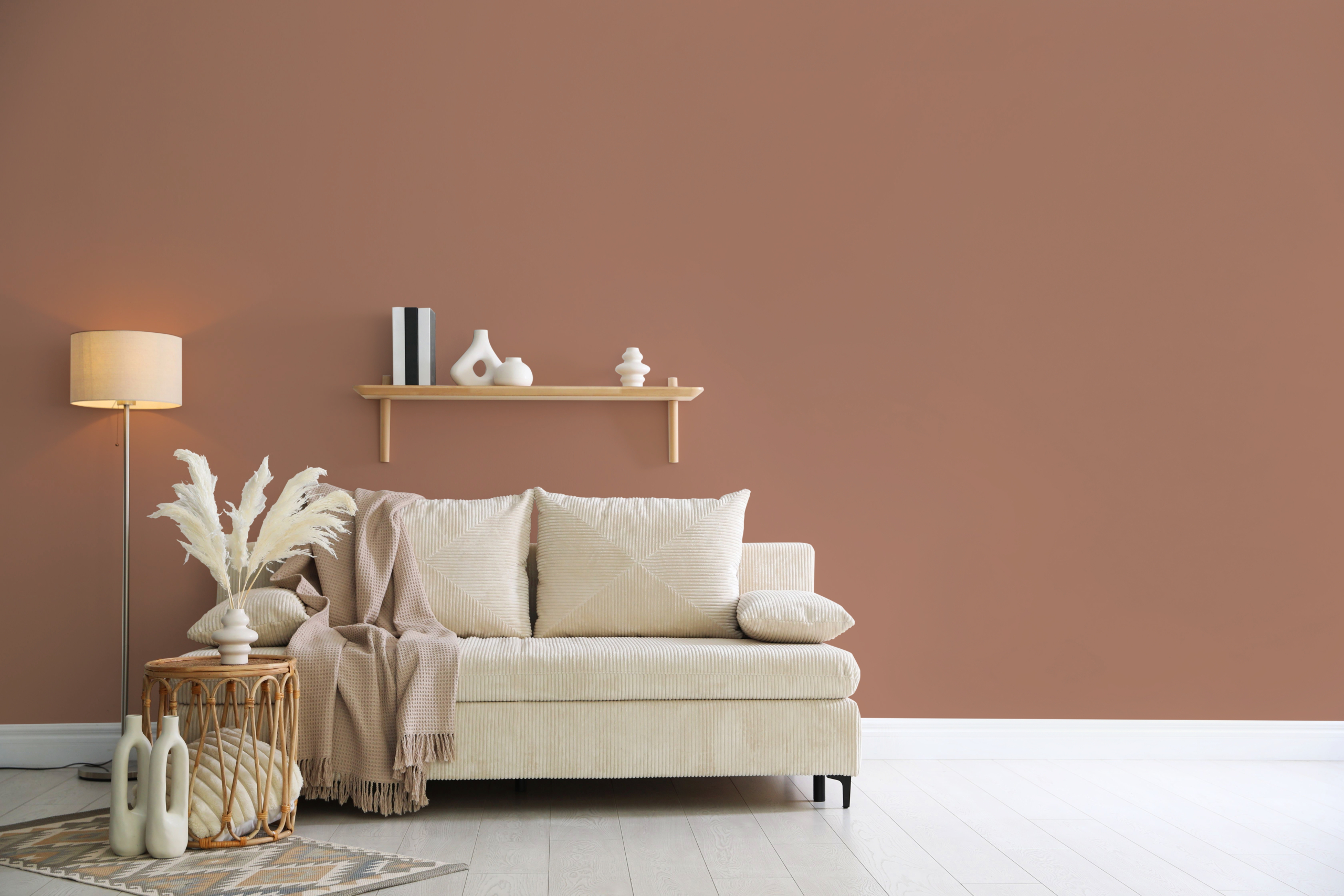 Stylish,Living,Room,With,Wall,In,Mocha,Mousse,Shade.,Interior how to make a small room look bigger through painting